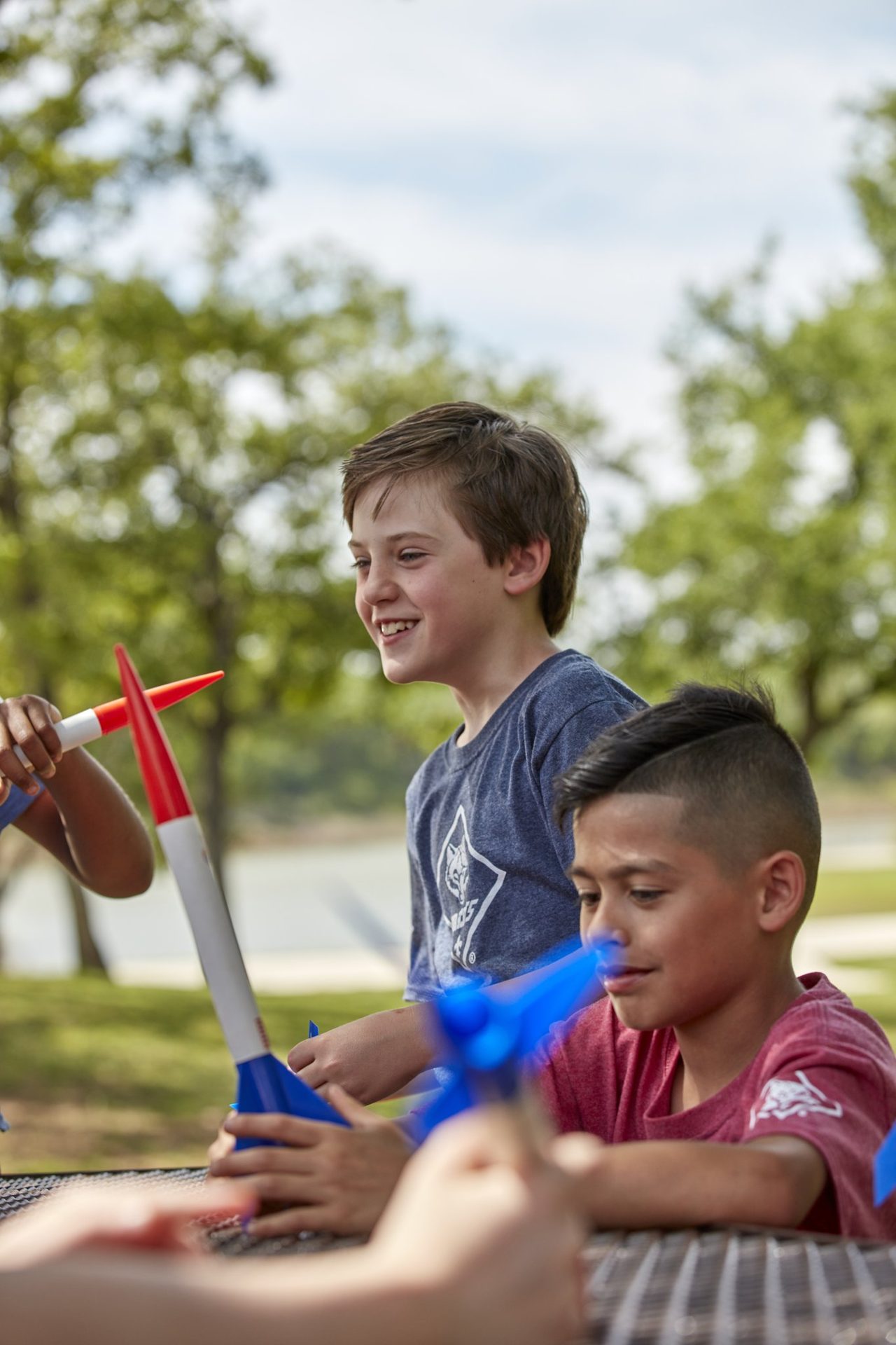 Scouts building model rockets