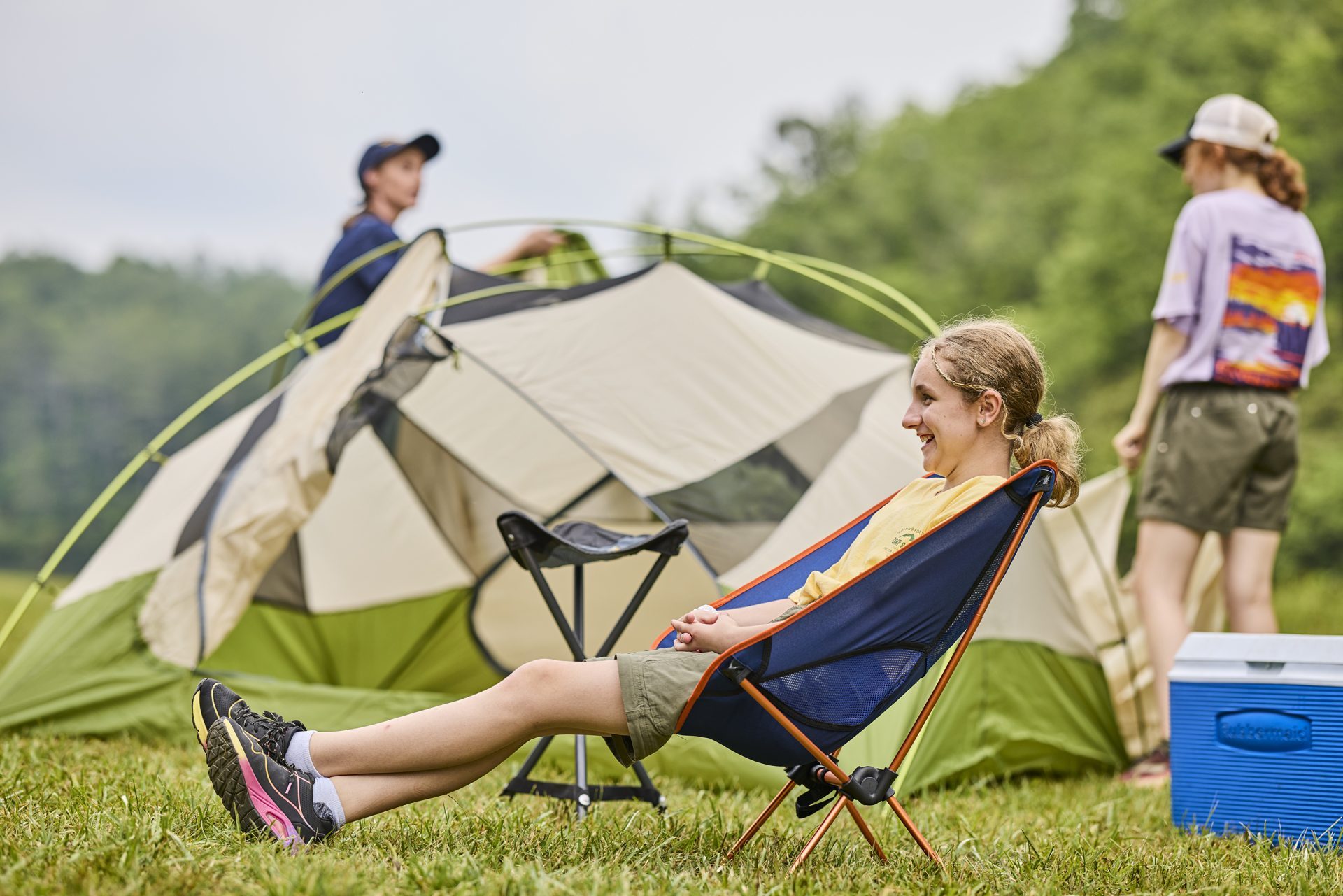 Scouts relaxing at a campsite